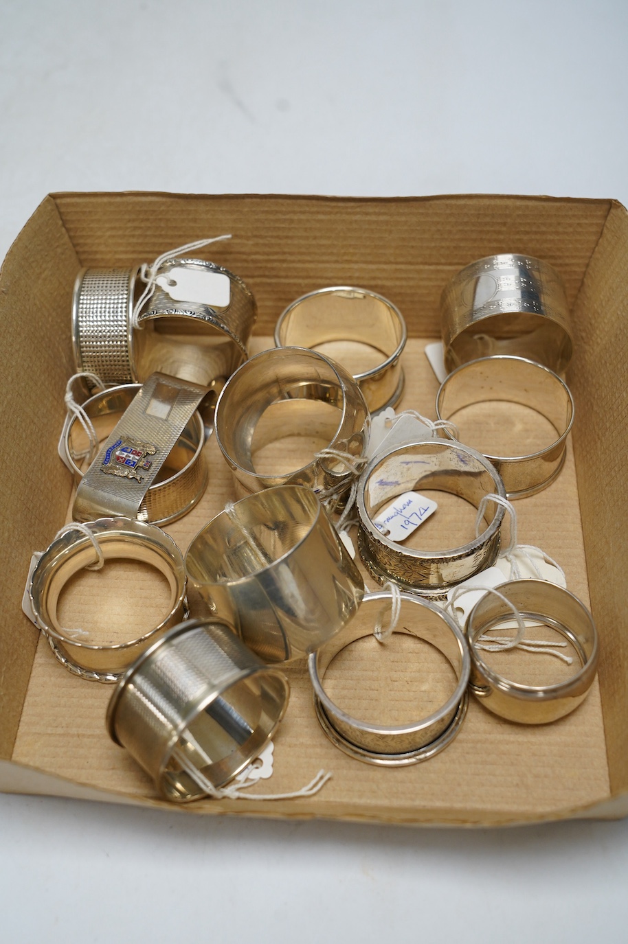 A collection of fifteen assorted early 20th century and later silver napkin rings, various dates and makers. Condition - poor to fair